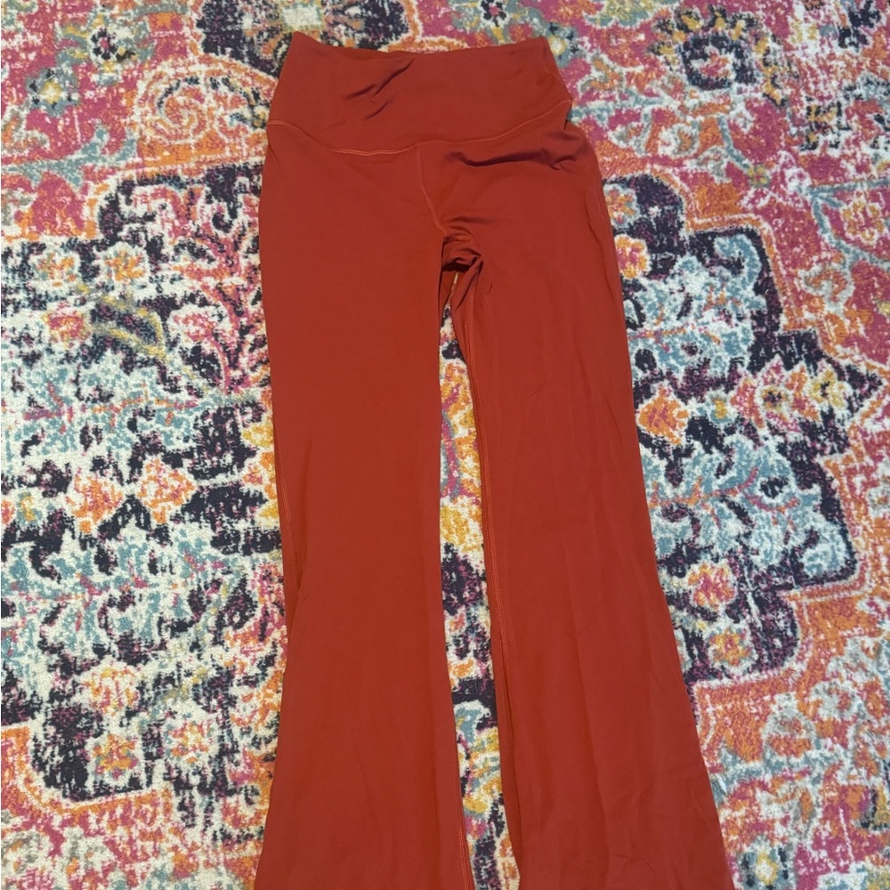 Burnt orange lululemon flare leggings. Size 10